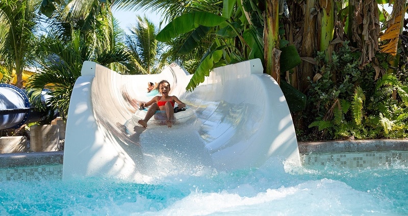 Children on a toboggan in Cancun