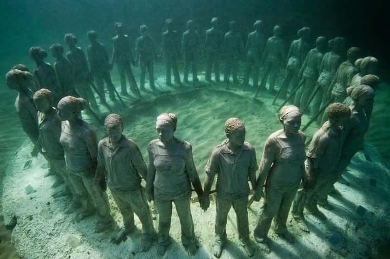 Works of art at the Underwater Museum of Art in Cancun