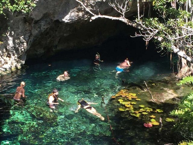 People in the cenotes in Tulum