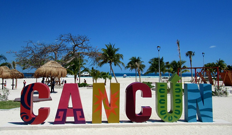 Cancun sign on Langosta Beach