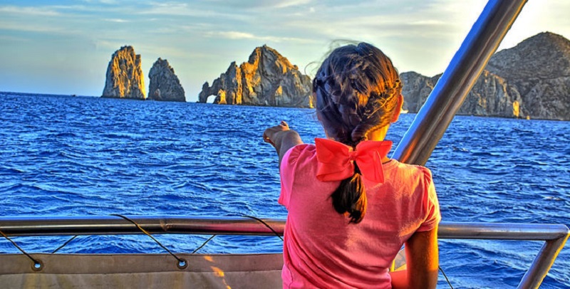 Child going to the El Arco monument in Los Cabos